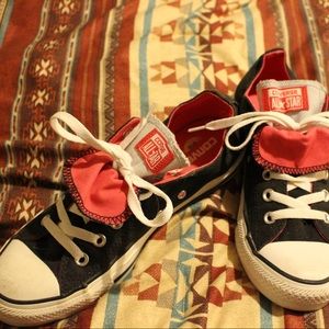 Black and pink double tongue converse